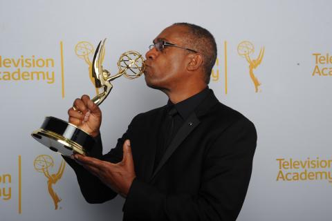 Joe Morton of Scandal celebrates his win at the 2014 Primetime Creative Arts Emmys.