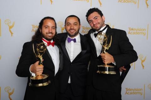 The Square editing team members Mohamed El Manasterly (l), Pedro Kos (c) and Christopher de la Torre (r) celebrate their win for Outstanding Picture Editing for Nonfiction Programming at the 2014 Primetime Creative Arts Emmys.