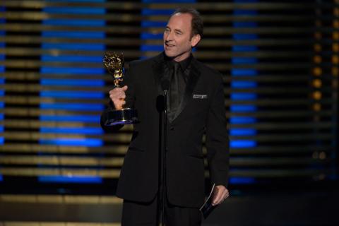 Editor Skip Macdonald of Breaking Bad accepts an award at the 2014 Primetime Creative Arts Emmys.