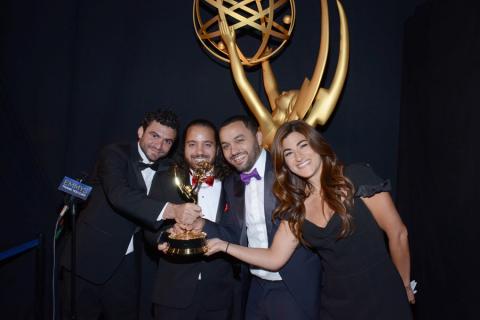 The Square editing team celebrates their win at the 2014 Primetime Creative Arts Emmys.