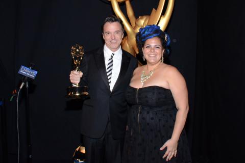 The Oscars production design team members Derek McLane (l) and Gloria Lamb (r) celebrate their win at the 2014 Primetime Creative Arts Emmys.