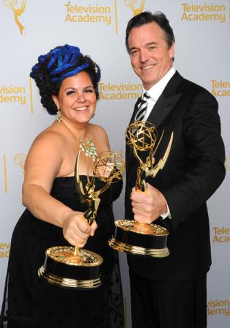 The Oscars art direction team members Gloria Lamb (l) and Derek McLane (r) celebrate their win at the 2014 Primetime Creative Arts Emmys.
