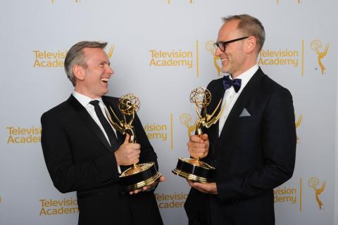 Saturday Night Live costume designers Eric Justian (l) and Tom Broecker (r) celebrate their win at the 2014 Primetime Creative Arts Emmys.