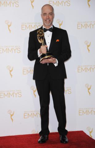 William Turro celebrates at the 2014 Primetime Creative Arts Emmys.