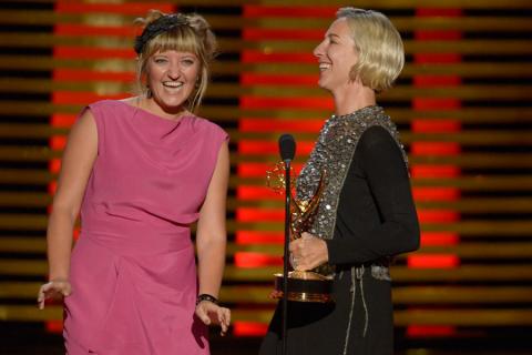 Nina Ayres and Michele Clapton accept the award for outstanding costumes for a series for Game of Thrones.