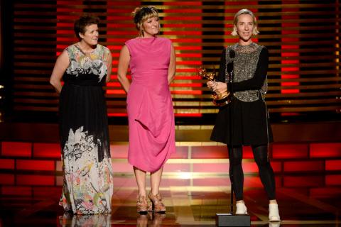 Sheena Wichary (l) Nina Ayres (c) and Michele Clapton (r) accept the award for outstanding costumes for a series for Game of Thrones.