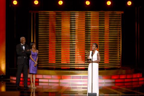 Uzo Aduba accepts the award for outstanding guest actress in a comedy series for her work on Orange Is the New Black.