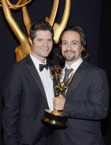 Tom Kitt (l) and Lin-Manuel Miranda (r) celebrate at the 2014 Primetime Creative Arts Emmys.