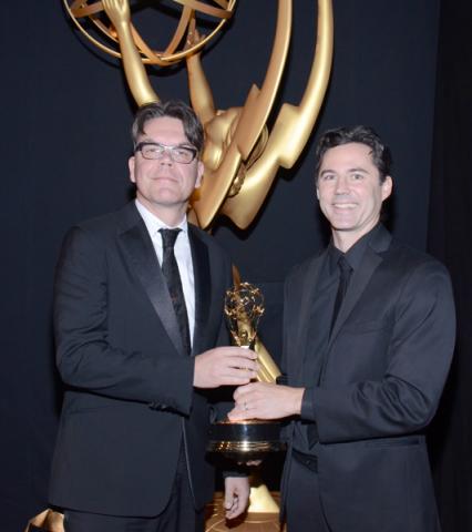 Treme sound mixers Blake Leyh (l) and Andy Kris (r) celebrate their win at the 2014 Primetime Creative Arts Emmys.