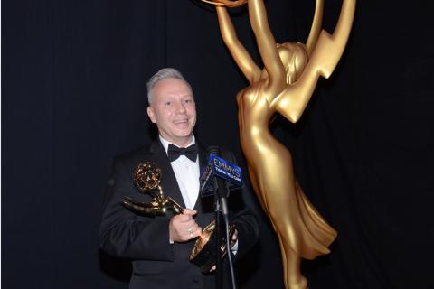 Dima Malanitchev celebrates at the 2014 Primetime Creative Arts Emmys.