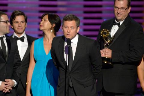 The Shark Tank team accepts an award at the 2014 Primetime Creative Arts Emmys.