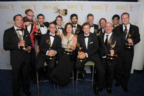 The Colbert Report cast and crew celebrate their win at the 2014 Primetime Creative Arts Emmys.