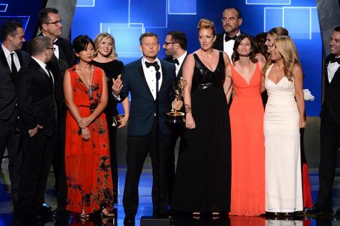 The team of Shark Tank accepts their award at the 2015 Creative Arts Emmys.