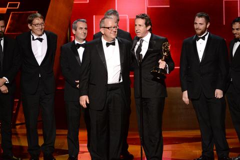 The team of “Game of Thrones” accepts their award at the Creative Arts Emmy Awards.