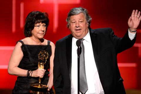 Karen Goodman and Kirk Simon accept their award at the 2015 Creative Arts Emmys.