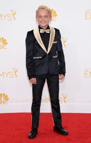 Mason Vale Cotton of Mad Men arrives at the 66th Emmys.