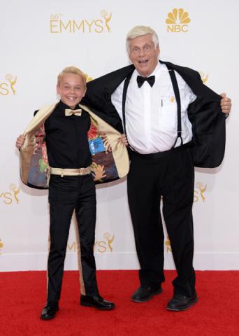 Mason Vale Cotton and Robert Morse of Mad Men arrive at the 66th Emmys.