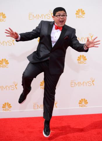 Rico Rodriguez of Modern Family arrives at the 66th Emmy Awards.
