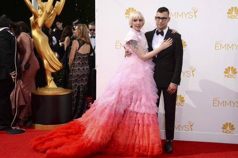 Lena Dunham of Girls and musician Jack Antonoff arrive at the 66th Emmy Awards.
