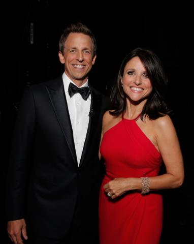 Seth Meyers (l) of Late Night with Seth Meyers and Julia-Louis Dreyfus of Veep at the 66th Emmy Awards.