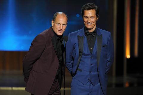 Woody Harrelson (l) and Matthew McConaughey (r) of True Detective present an award at the 66th Emmys.