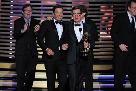 Jimmy Fallon (l) of The Tonight Show Starring Jimmy Fallon and Stephen Colbert (r) of The Colbert Report at the 66th Emmy Awards.