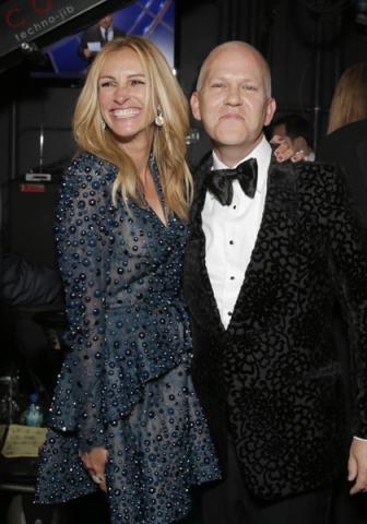 Julia Roberts (l) and Ryan Murphy (r) of The Normal Heart backstage at the 66th Emmys. 