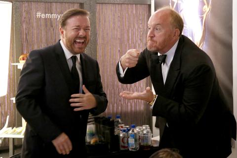 Ricky Gervais (l) of Derek and Louis C.K. (r) of Louie backstage at the 66th Emmys. 
