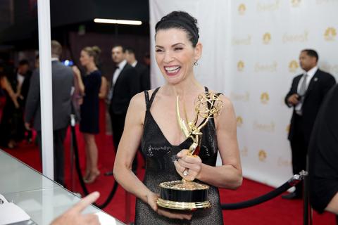 Julianna Margulies of The Good Wife celebrates at the 66th Emmys.
