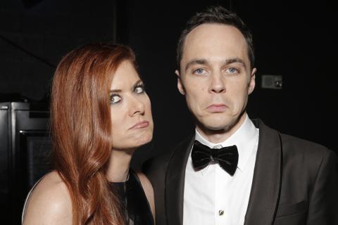 Debra Messing and Jim Parsons at the 66th Emmys.