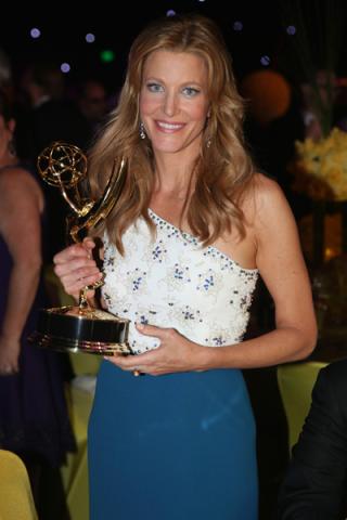 Anna Gunn of Breaking Bad celebrates her win at the 66th Emmys Governors Ball.