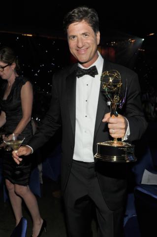 Modern Family executive producer Steven Levitan celebrates his win at the 66th Emmys Governors Ball.