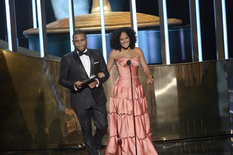 Anthony Anderson and Tracee Ellis Ross present an award at the 67th Emmy Awards.