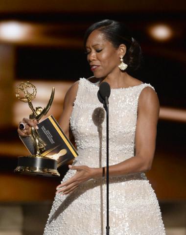 Regina King accepts her award at the 67th Emmy Awards.