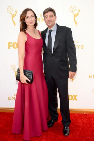 Kathryn Chandler and Kyle Chandler on the red carpet at the 67th Emmy Awards.