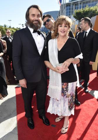 Will Forte, John Stamos and Patricia C. Forte on the red carpet at the 67th Emmy Awards.