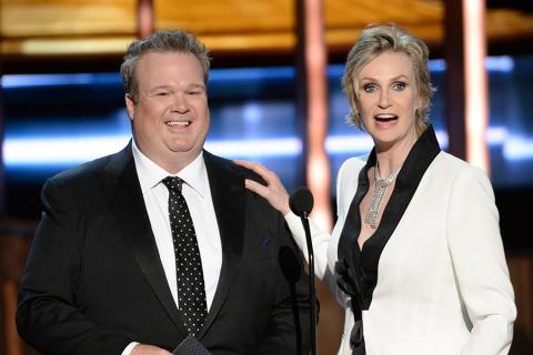 Eric Stonestreet and Jane Lynch at the 67th Emmy Awards.