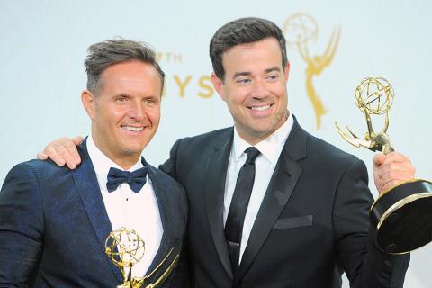 Mark Burnett and Carson Daly backstage at the 67th Emmy Awards.