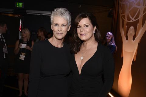 Jamie Lee Curtis and Marcia Gay Harden backstage at the 67th Emmy Awards. 