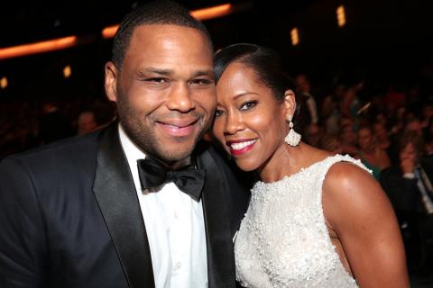 Anthony Anderson and Regina King at the 67th Emmy Awards.