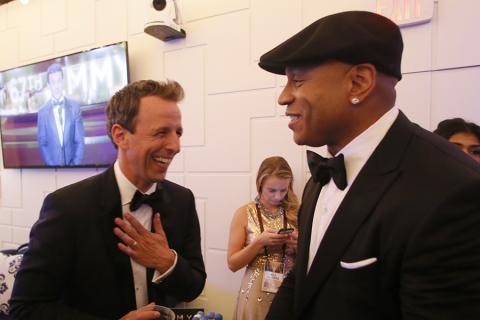 Seth Meyers and LL Cool J backstage at the 67th Emmy Awards.