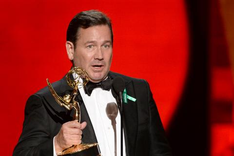 David Nutter accepts an award at the 67th Emmy Awards. 