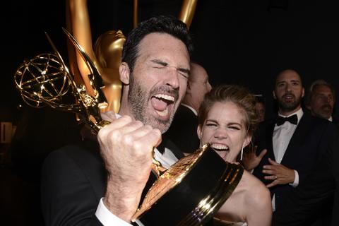 Reid Scott and Anna Chlumsky backstage at the 67th Emmy Awards.