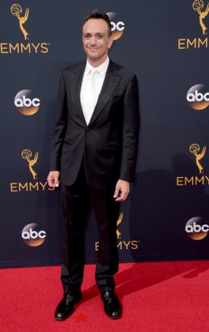 Hank Azaria arrives on the red carpet at the 2016 Primetime Emmys. 