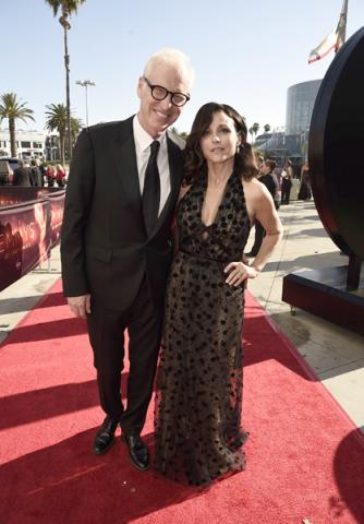 Brad Hall and Julia Louis-Dreyfus on the red carpet at the 2016 Primetime Emmys.