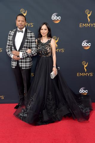 Terrence Howard and Miranda Pak on the red carpet at the 2016 Primetime Emmys.