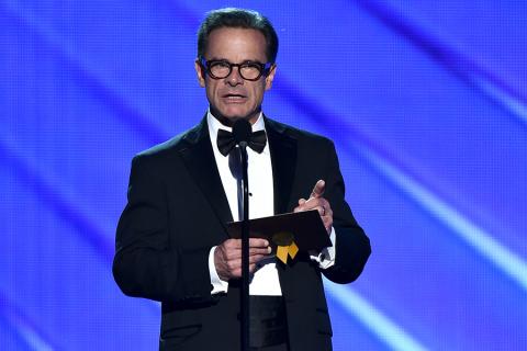 Peter Scolari presents an award at the 2016 Primetime Emmys.