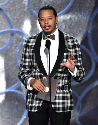 Terrence Howard presents an award at the 2016 Primetime Emmys.
