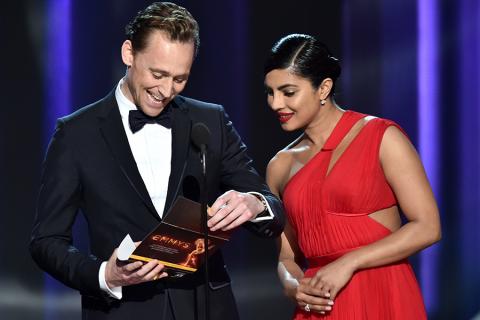 Tom Hiddleston and Priyanka Chopra present an award at the 68th Primetime Emmy Awards. 
