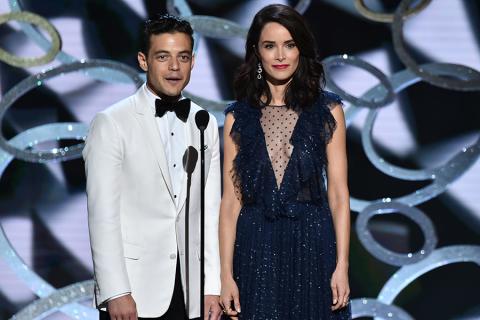 Rami Malek and Abigail Spencer on stage at the 2016 Primetime Emmys.